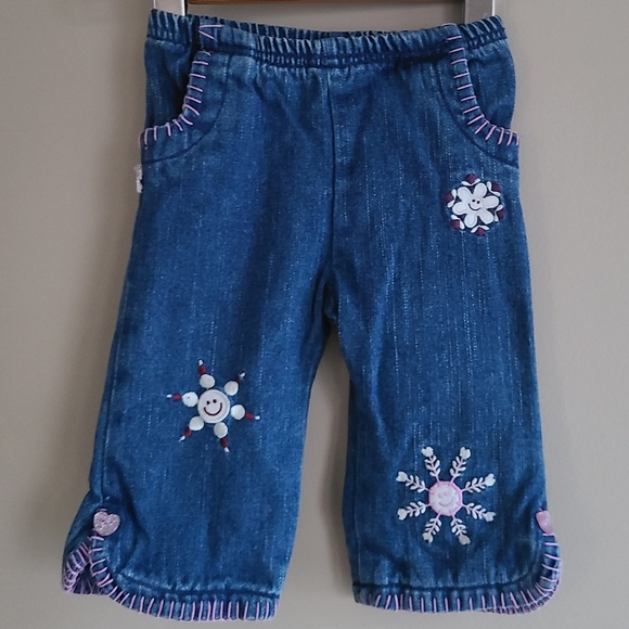 Lined blue jeans with embroidered snowflake detail - Picture 1 of 5